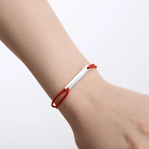 Silk bracelet with silver inserts