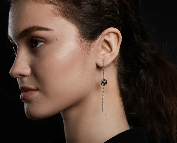 Silver earrings broaches Doll