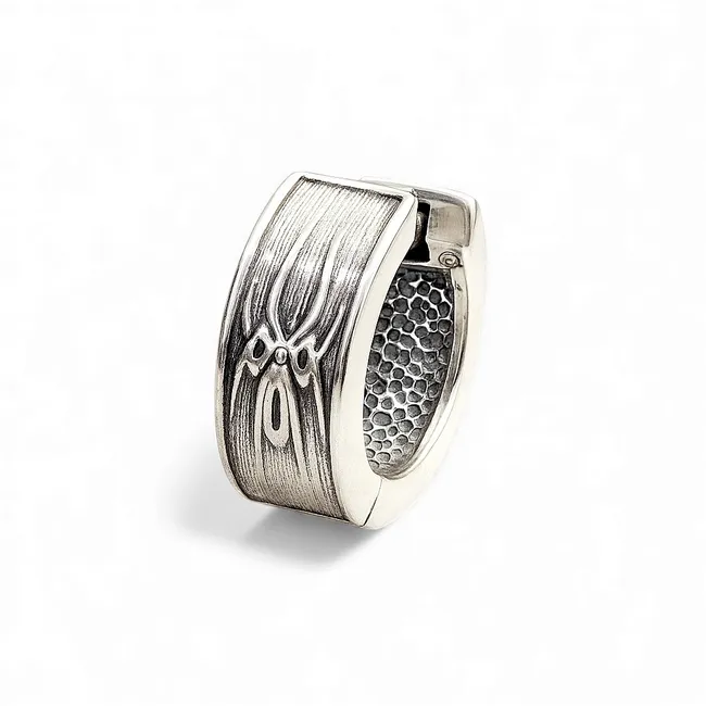 Срібна чоловіча сережка конго  