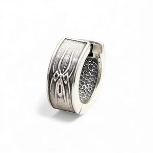 Срібна чоловіча сережка конго  